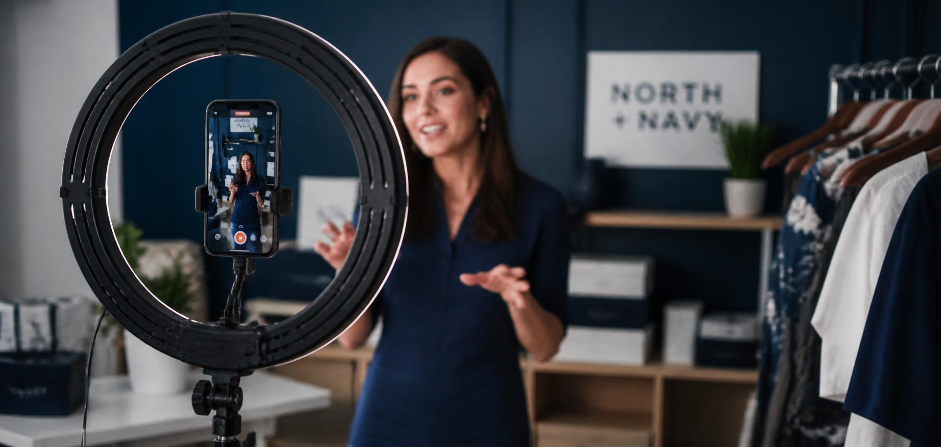 Creator filming a short-form video for a small business